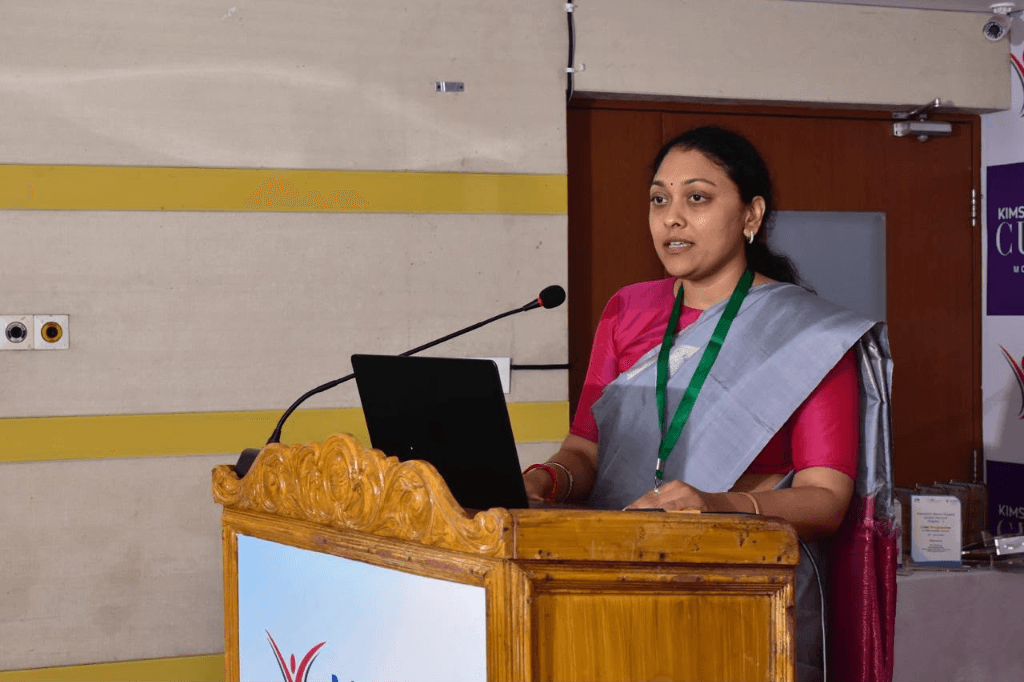 Dr. Swetha Rampally speaking at conference